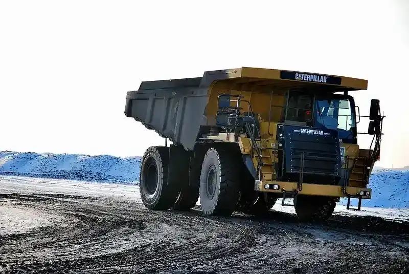 Heavy mining dumper truck representing lubricant testing for industrial equipment
